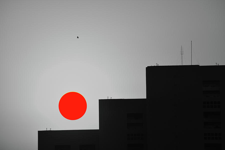 Red Sun Over Black Building Mixed Media