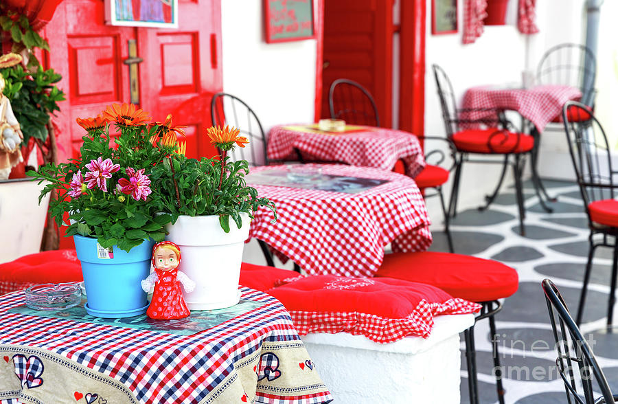 Red Tablecloths in Mykonos Town Greece Photograph by John Rizzuto