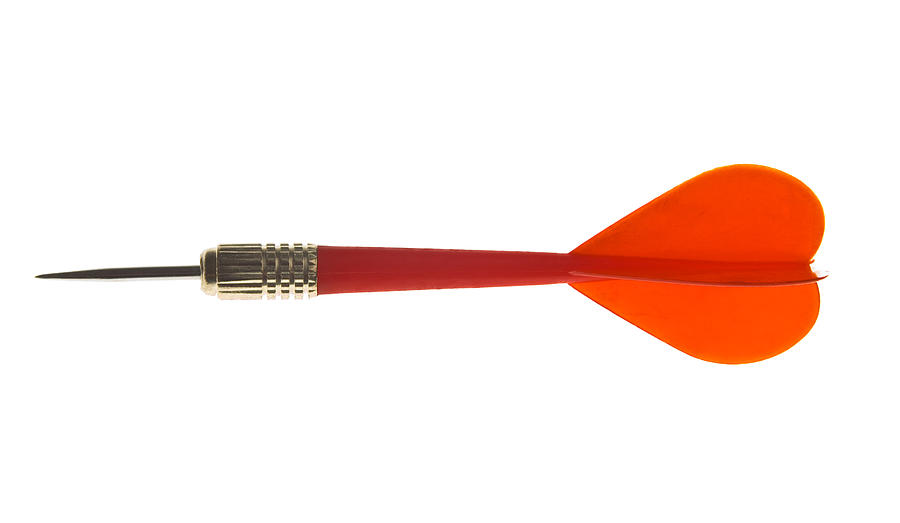 Red throwing dart on white background Photograph by Borisyankov