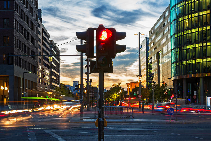 Red traffic lights and vehicle lights at rush hour in Berlin, Potsdamer Platz (Germany) Photograph by Fhm