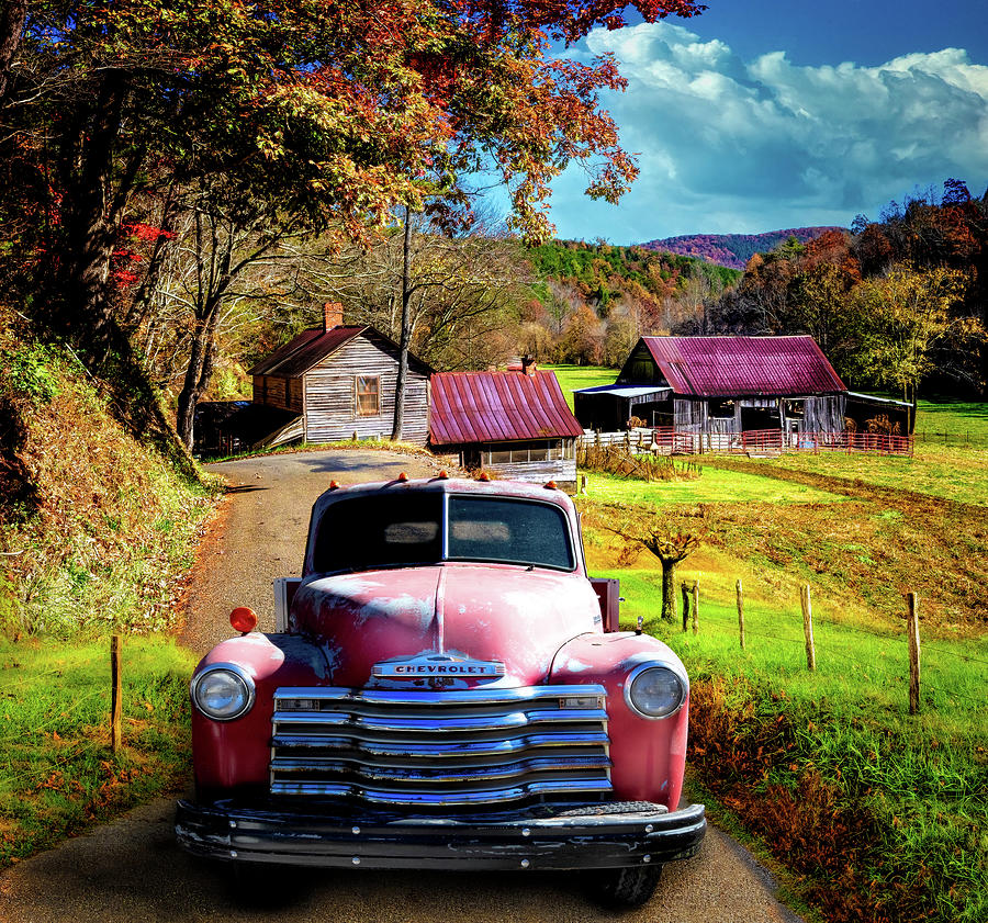 Red Truck in Autumn Colors at the Barns Photograph by Debra and Dave Vanderlaan