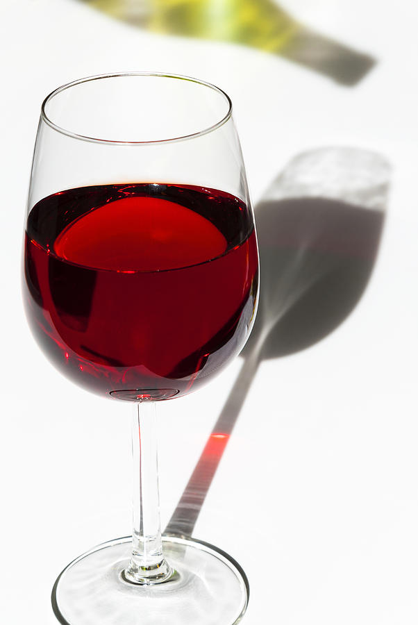 Red wine in a glass Photograph by Nico Tondini