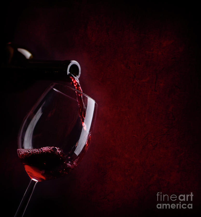 Red Wine Pouring In Wineglass Photograph