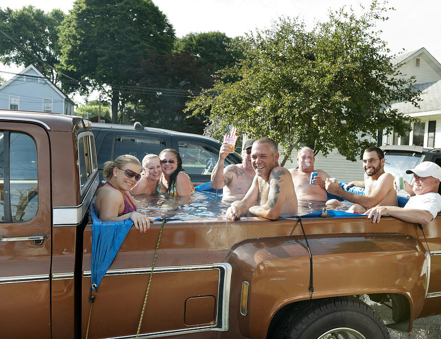 Redneck hot tub, 8 people partying in back of pick-up truck Photograph by Jonathansloane