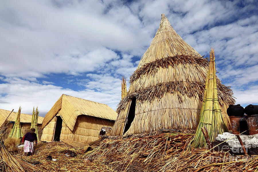 Reed houses on the Uros Islands Lake Titicaca Peru Photograph by James Brunker