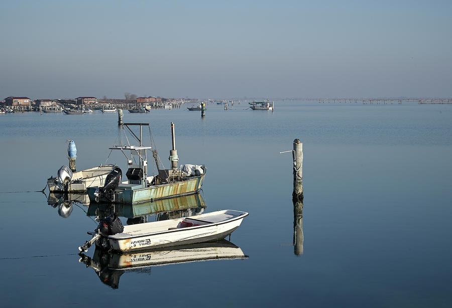 Reflected fishermens boats Photograph by Loredana Gallo Migliorini