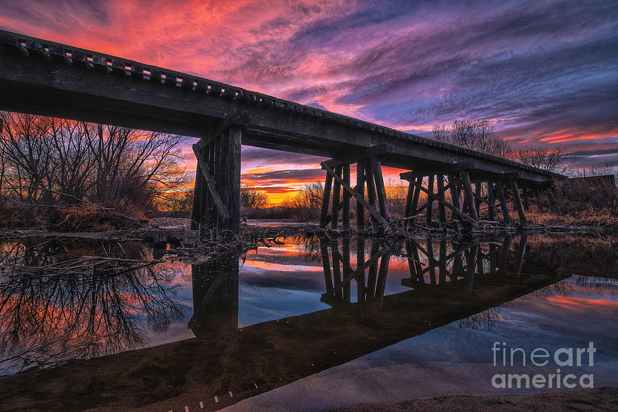 Reflected Railroad Trestle At Sunset Photograph