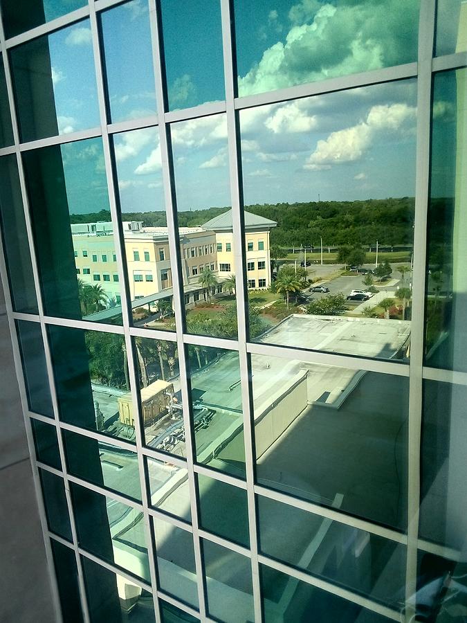 Reflecting on Kissimmee Hospital   Photograph by Christopher Mercer