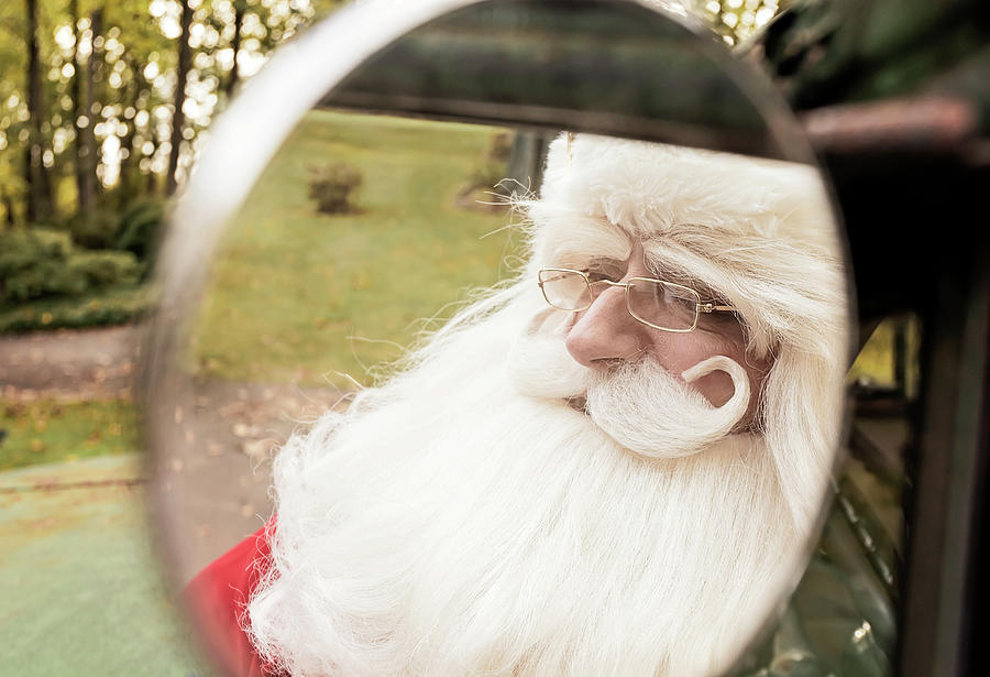 Reflecting on Santa Photograph by Travis Rogers