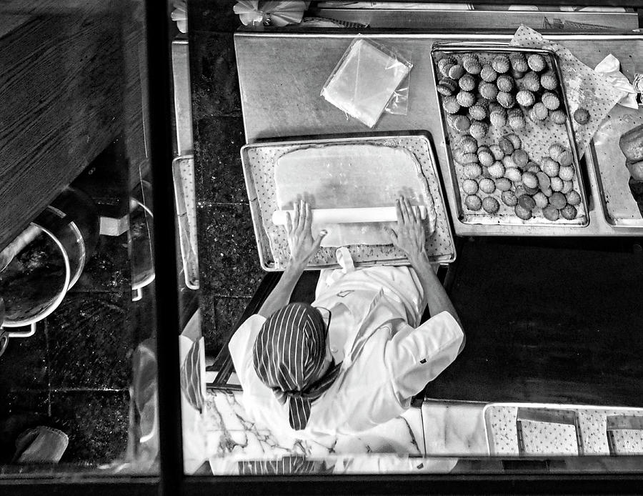 Reflection Of A Baker In San Miguel De Allende Photograph