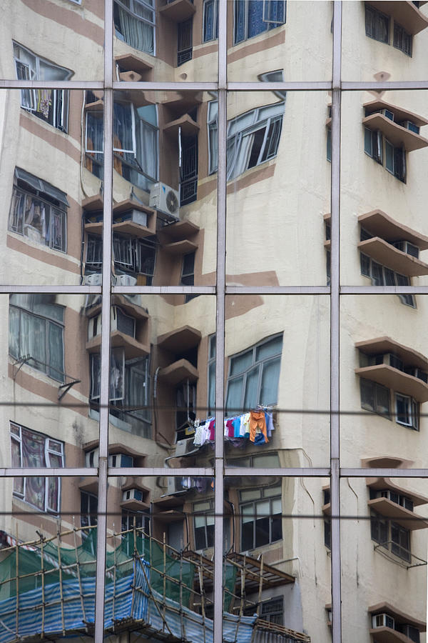 Reflection of an apartment block Photograph by David Henderson