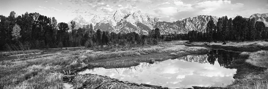 Reflection of clouds on water, Beaver Pond, Teton Range, Grand Teton National Park, Wyoming, USA Photograph by Panoramic Images