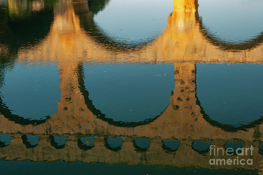 Reflection of Pont du Gard in the Gardon River Photograph by Bob Phillips
