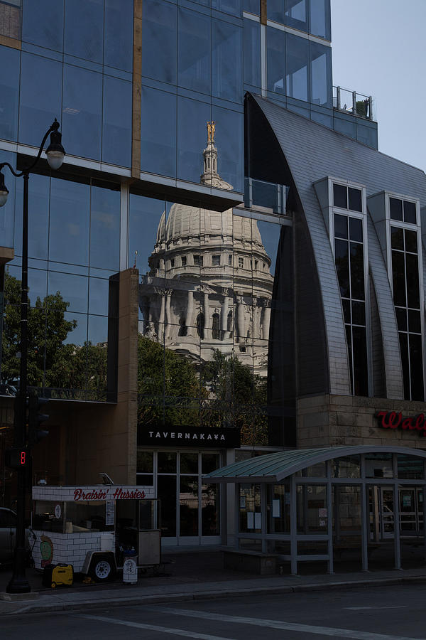 Reflection of the Wisconsin state capitol on a downtown building in Madison Wisconsin Photograph by Eldon McGraw