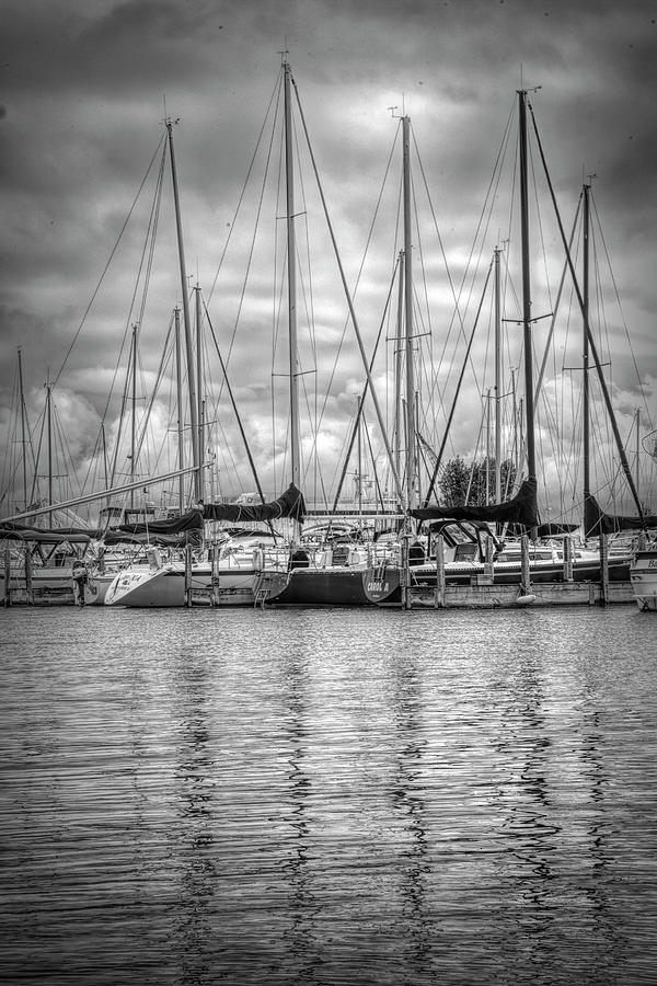 Reflections and Boats at the Harbor in Black and White Photograph by Debra and Dave Vanderlaan
