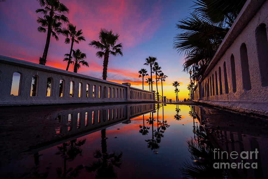 Reflections at sunset at Oceanside Pier Photograph by Rich Cruse