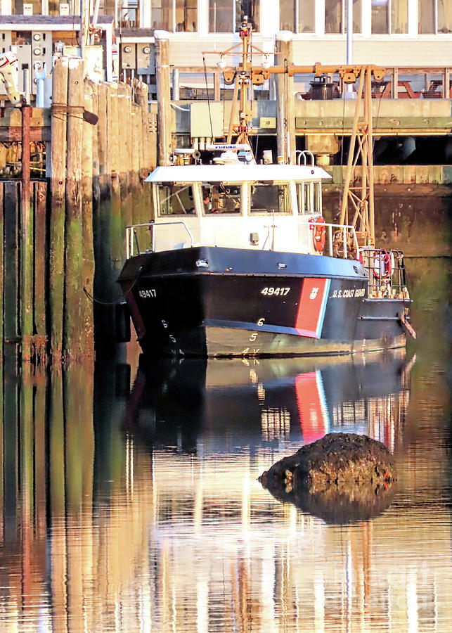 Reflections in Plymouth harbor  Photograph by Janice Drew
