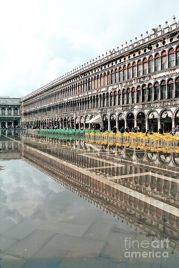 Reflections in S.Marco Square  - Venice - Italy Photograph by Paolo Signorini