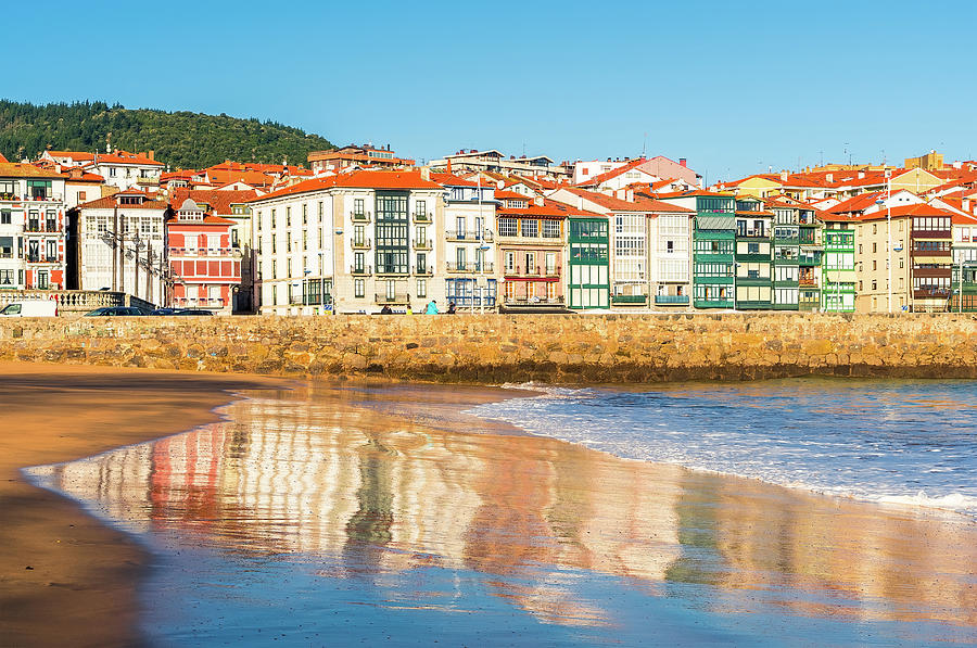 Reflections In The Sand Of The Town Of Lekeitio Photograph
