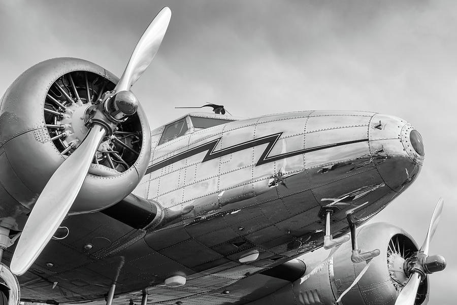 Reflections of a Lockheed Electra 12A  Photograph by Chris Buff