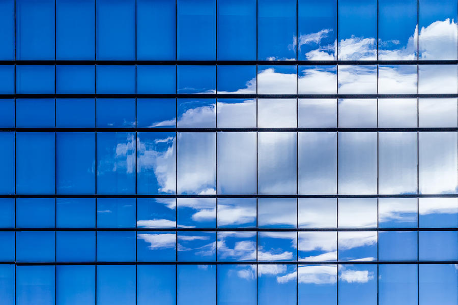Reflections of clouds in skyscrapers Photograph by Vicente Méndez