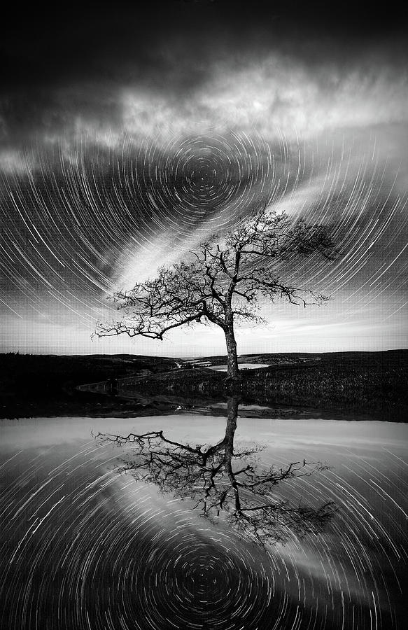 Reflections of Star Trails in Black and White Photograph by Debra and Dave Vanderlaan