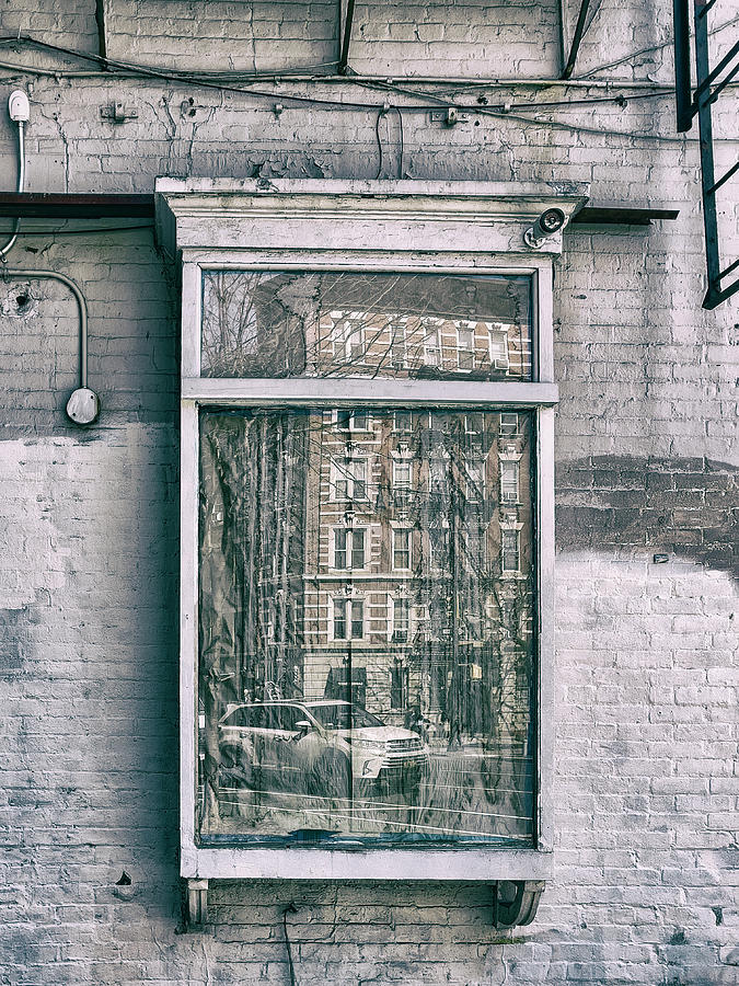Reflections on an old Window Photograph by Cate Franklyn