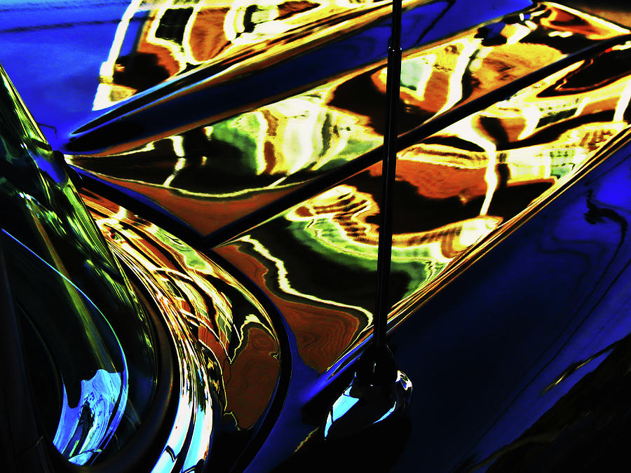 Reflections on the hood of a 57 Chevy Photograph by Bill Jonscher