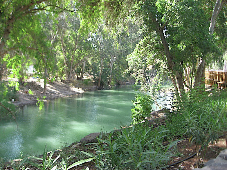 Reflections on the Jordan River Photograph by Susan Grunin