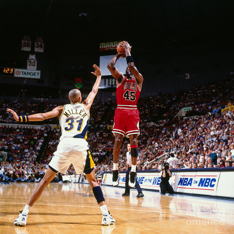 Reggie Miller and Michael Jordan Photograph by Nathaniel S. Butler Reggie Miller and Michael Jordan Photograph by Nathaniel S. Butler