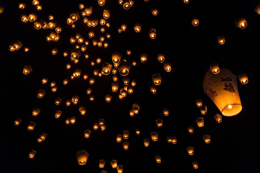 Relasing sky lanterns at Pinxi, New Taipei City Photograph by Tommi Kokkola Photography