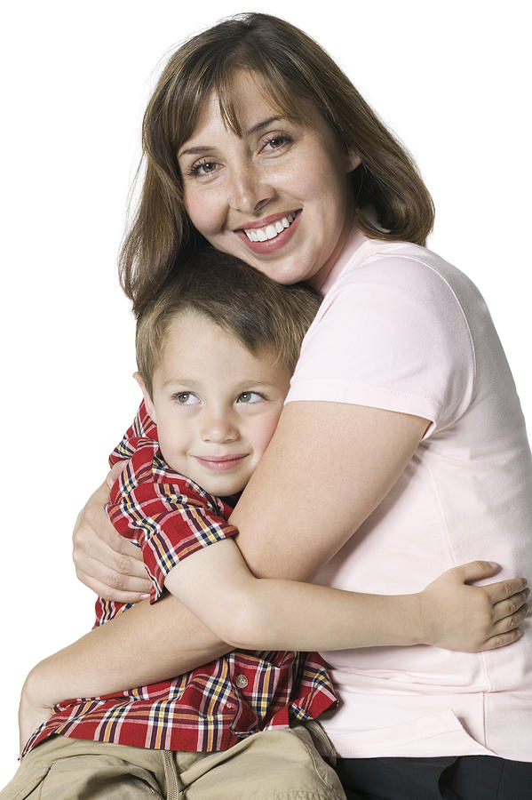 Relationship Portrait Of A Mother Smiling And Hugging Her Young Son Photograph by Photodisc