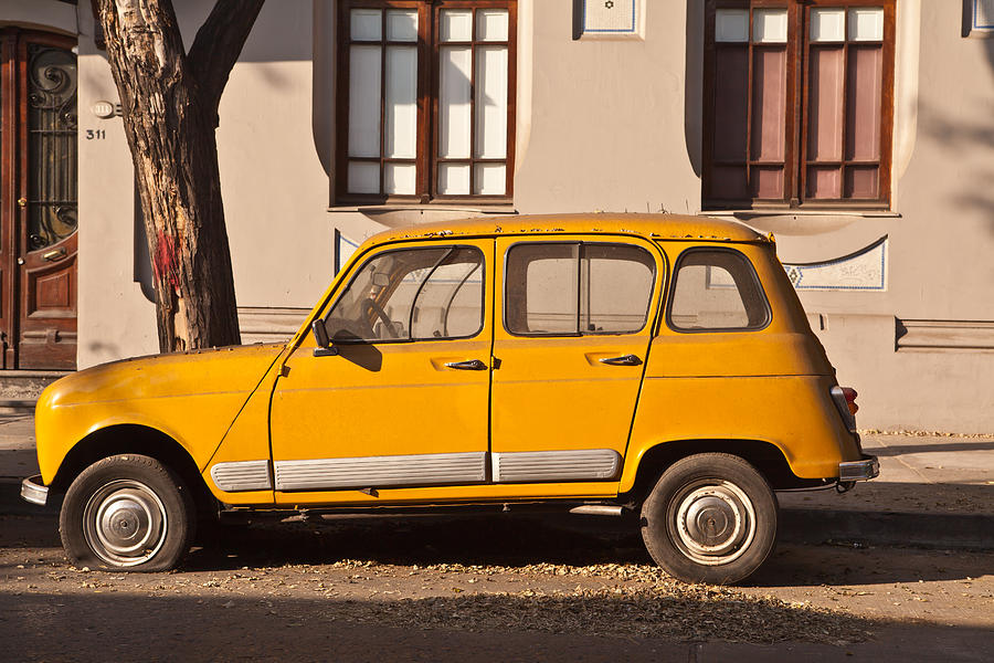 Renault 4 in the street Photograph by Bibi57