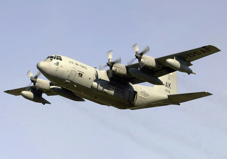 Rescue Squadron HC-130 Photograph by Robert Braley