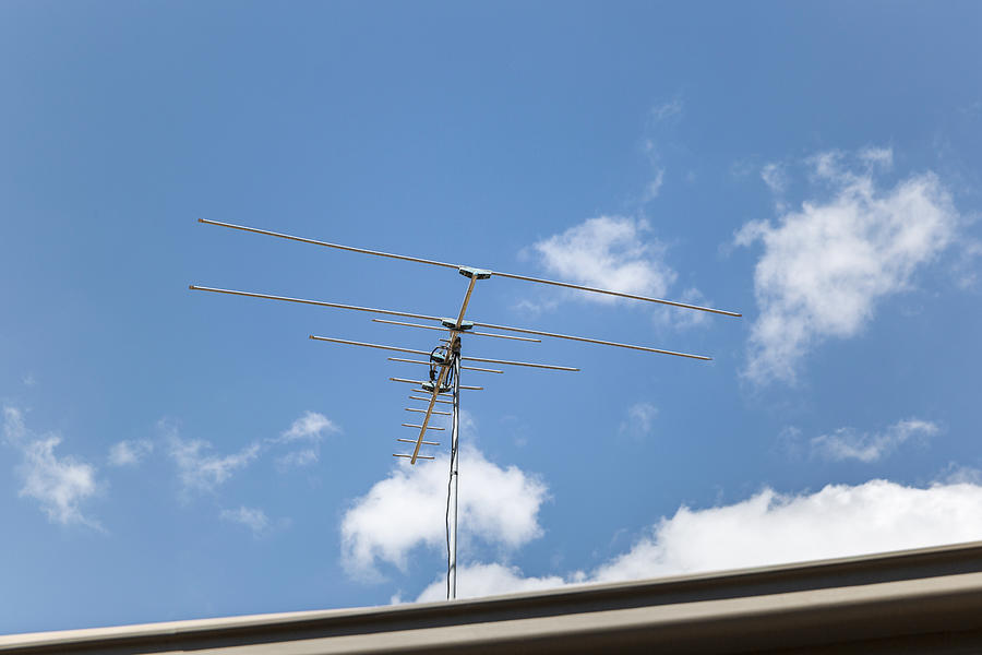 Residential TV Antenna Point Into Beautiful Blue Skies Photograph by Tim Allen