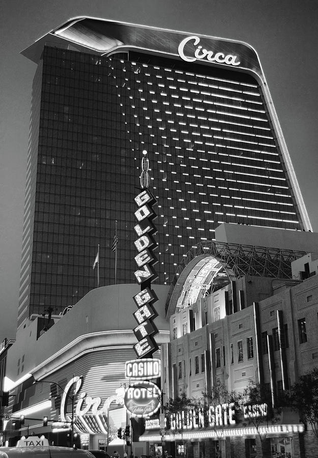 Retro Modern Circa Hotel Tower above Classic Golden Gate Casino Downtown Las Vegas Black and White Photograph by Shawn OBrien