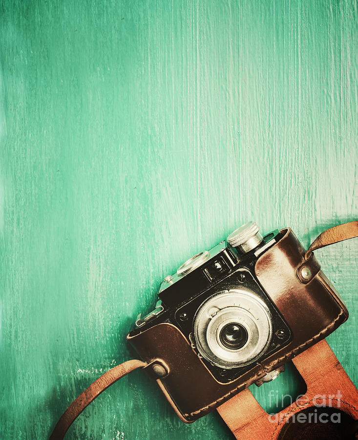 Retro photo camera on vintage background Photograph by Jelena Jovanovic