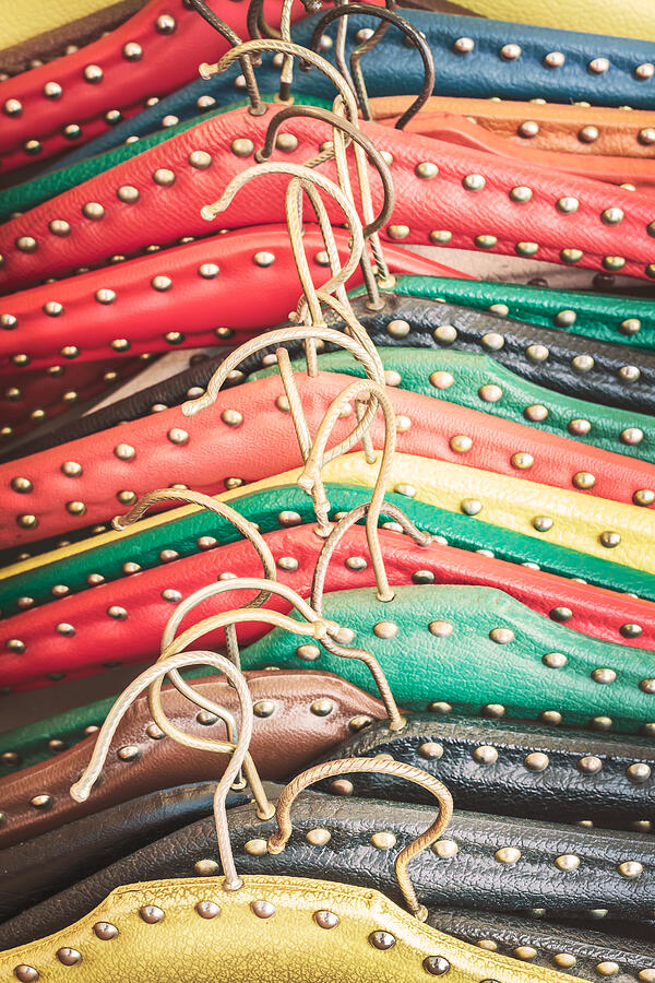 Retro styled image of old dress hangers Photograph by DutchScenery