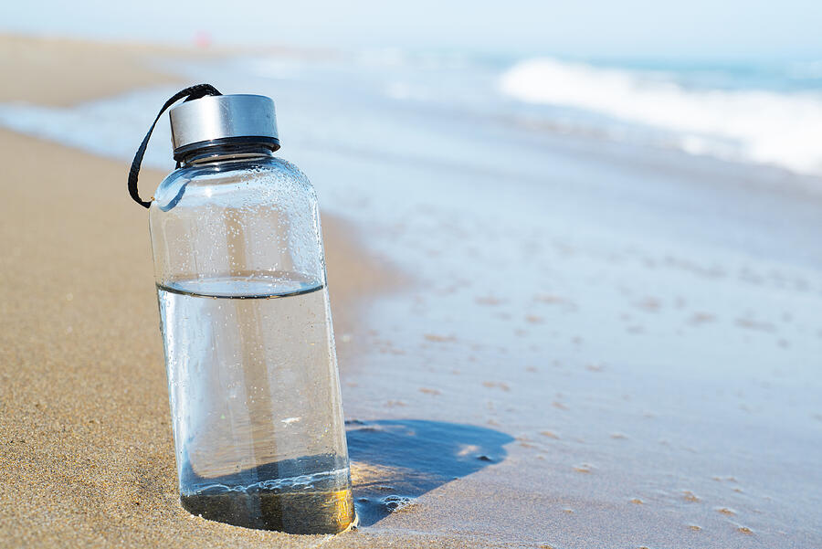 Reusable Water Bottle On The Beach Photograph by Nito100