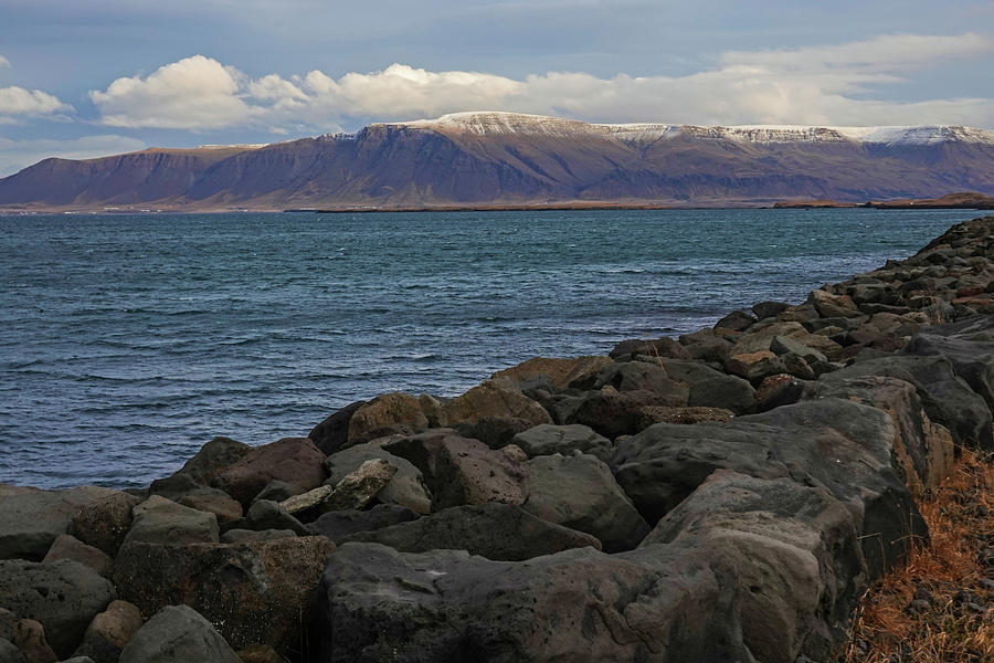 Reykjavik Rock Wall and Waterfront Esjan Mountain Photograph by Toby McGuire