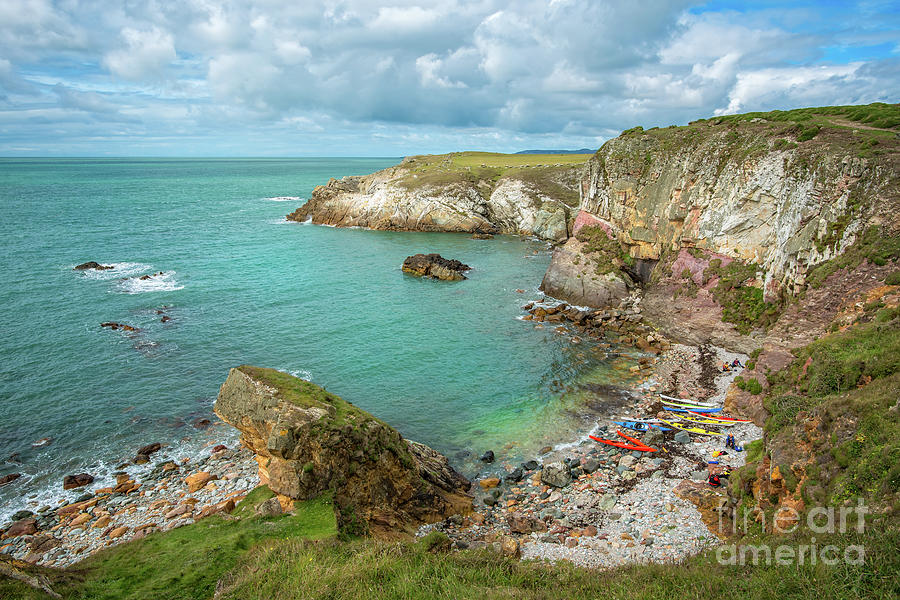 Rhoscolyn Bay Canoes Anglesey Wales Photograph by Adrian Evans
