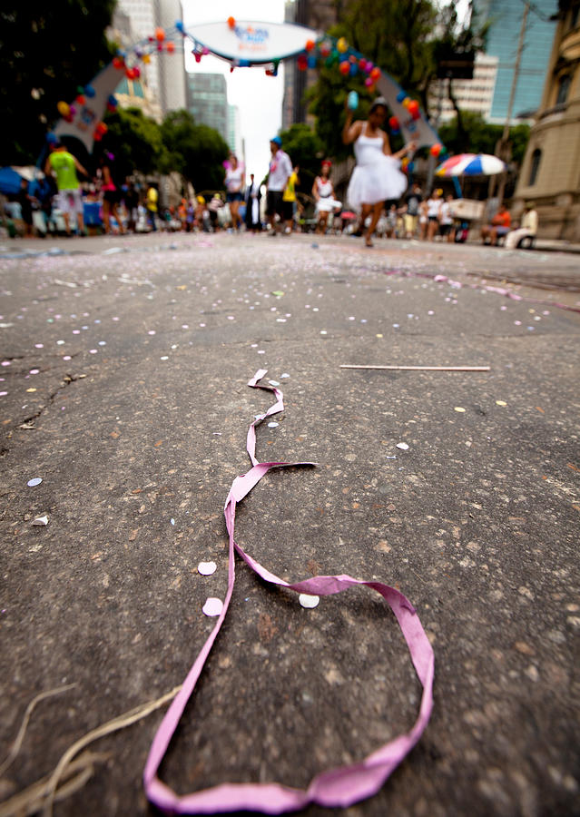Ribbons and confetti in the wake of a Bloque Photograph by Epicurean