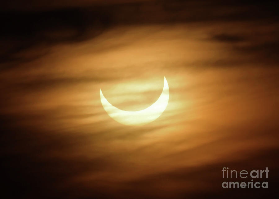 Ring of Fire Partial Solar Eclipse at Sunrise Photograph by Paula Guttilla