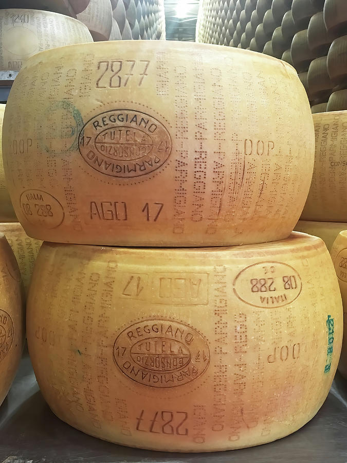 https://images.fineartamerica.com/images/artworkimages/mediumlarge/3/ripe-parmigiano-reggino-cheese-wheels-ready-for-export-deborah-league.jpg