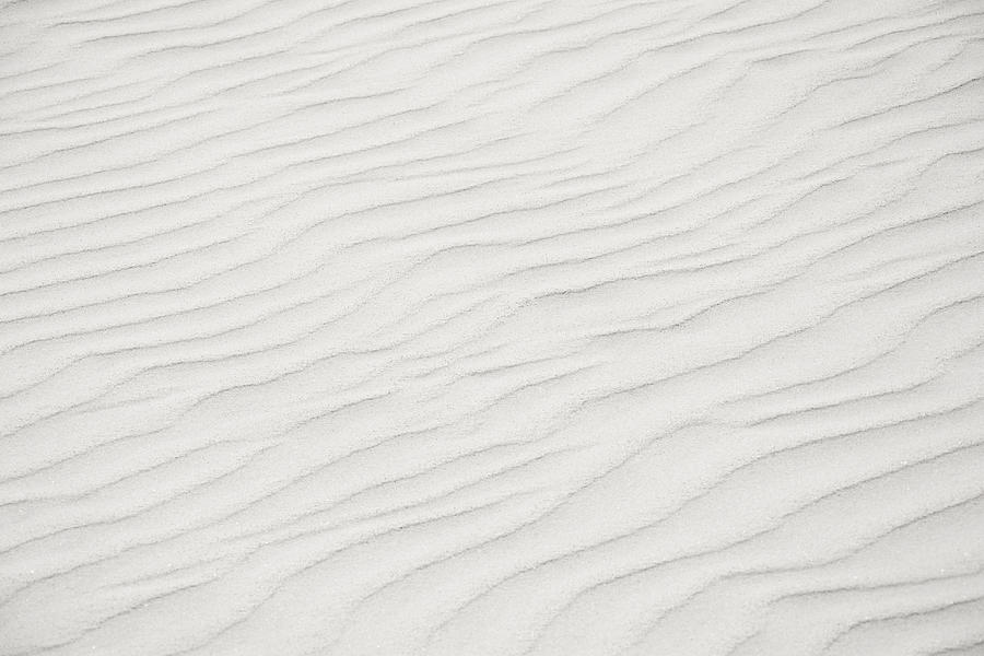 Rippled sand in beach Photograph by Chris Hackett
