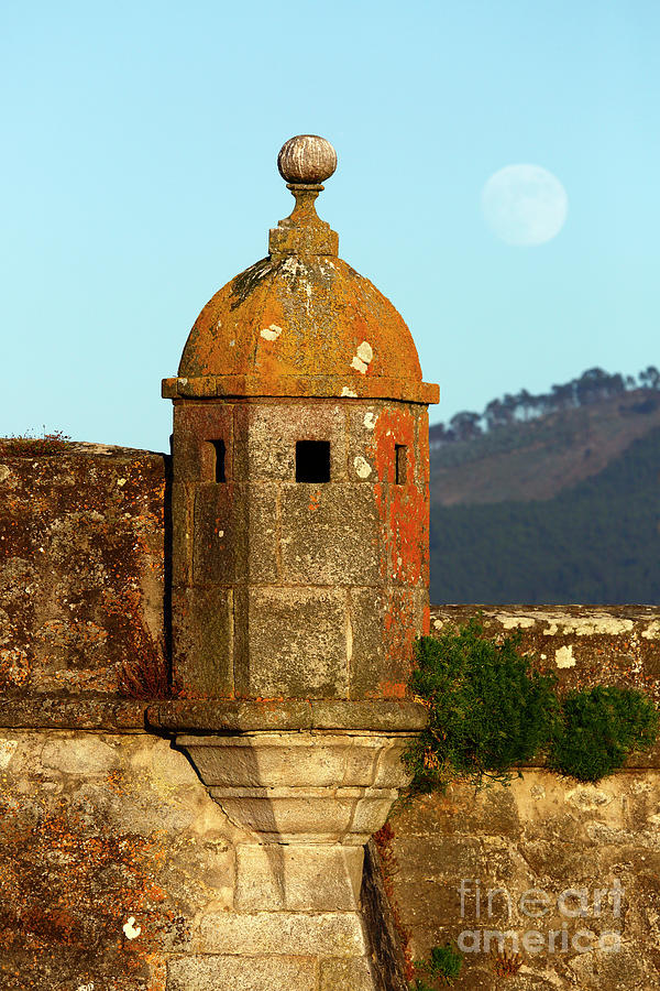 Rising moon and tower of Forte de Ancora Portugal Photograph by James Brunker