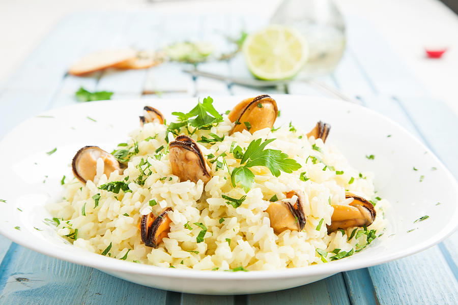 Risotto with mussels Photograph by Elikatseva