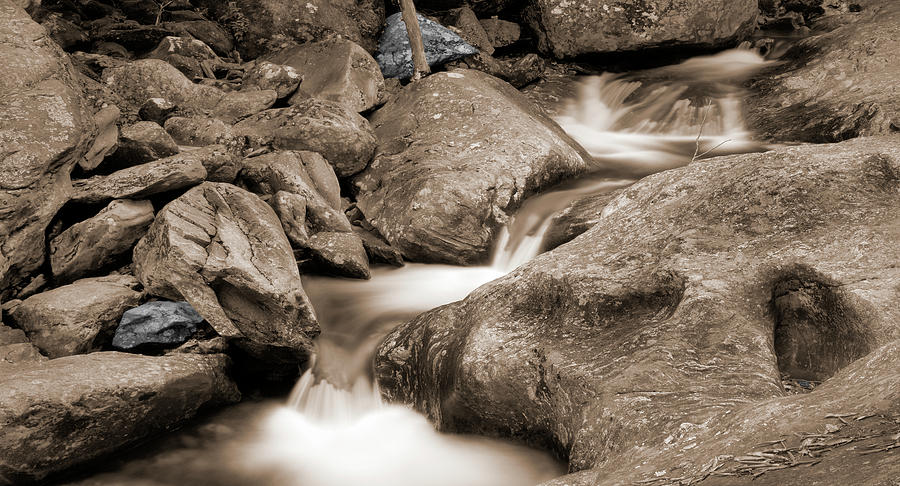 River Flows  6s Photograph by Mike McGlothlen
