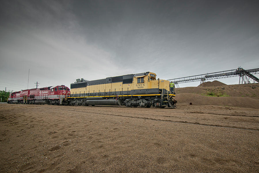 RJ Corman empty sand train Z543-07 with GMTX 9059 Photograph by Jim Pearson