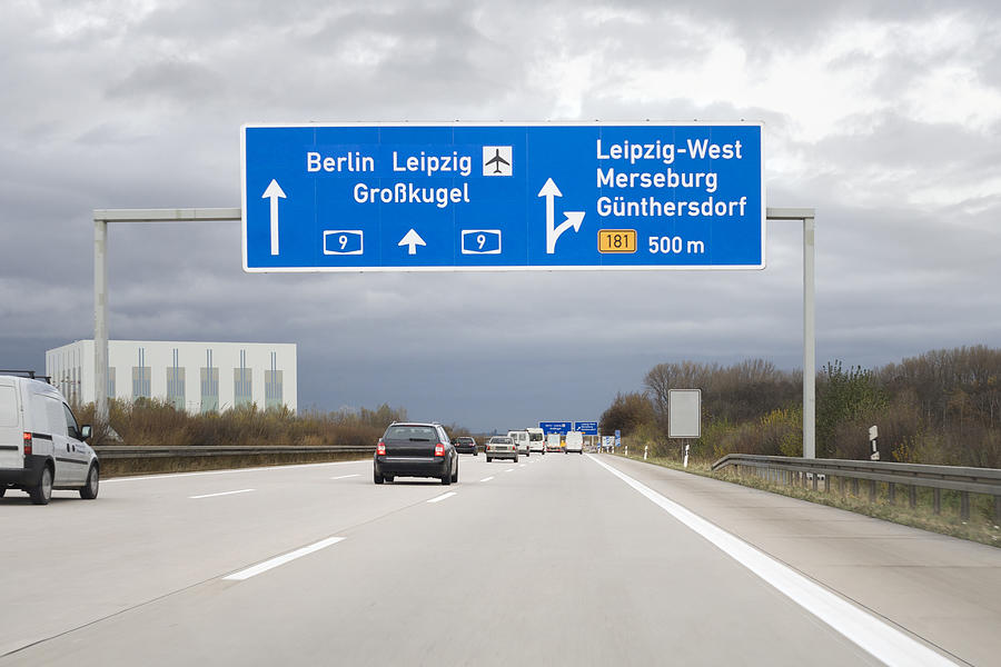 Road sign on german autobahn - next exit Leipzig-West Photograph by Ollo